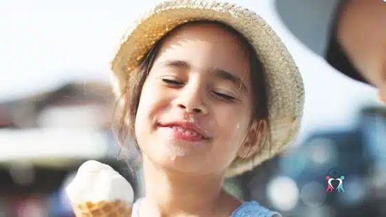 girl with ADHD with good behavior enjoying with ice cream