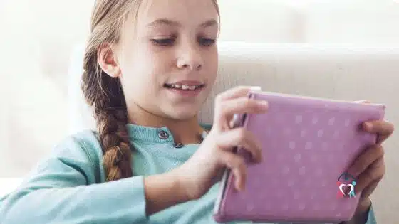 Girl with ADHD using an Ipad