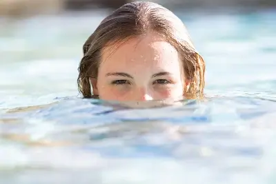 slightly overweight girl swimming